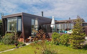 Holiday home Zeemeeuw with own fishing pier